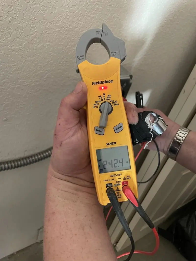Voltage testing with clamp meter during Hot Tub / Pool Electrical Wiring in Woodbury